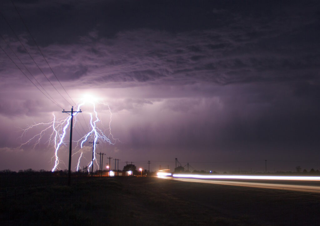 Lightning next to the highway