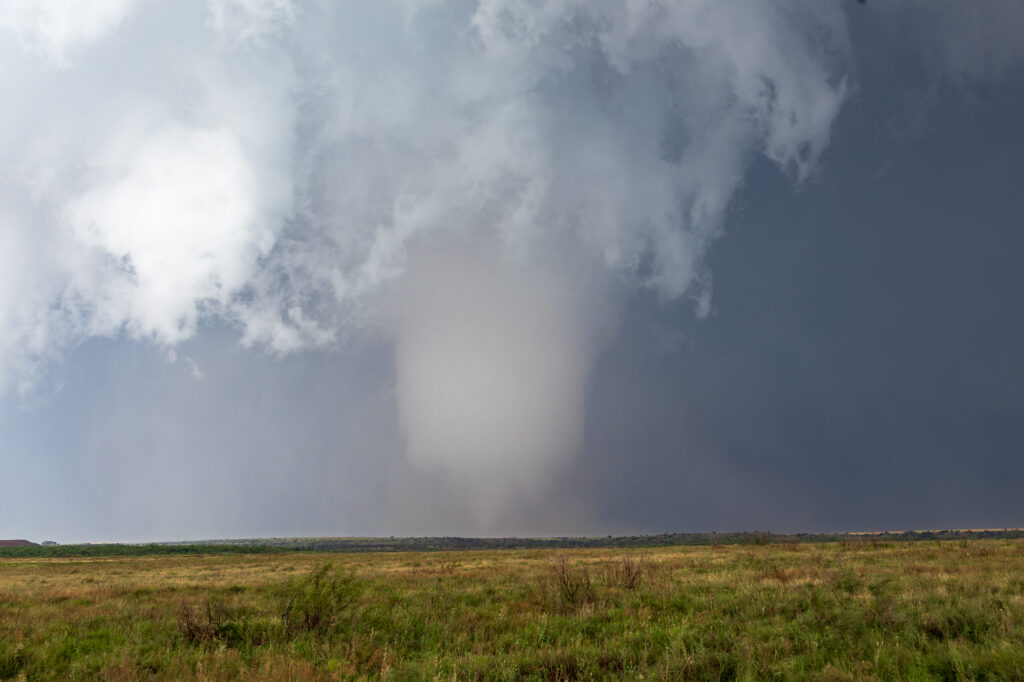 A fat truncated cone with a drillbit near Olustee Oklahoma